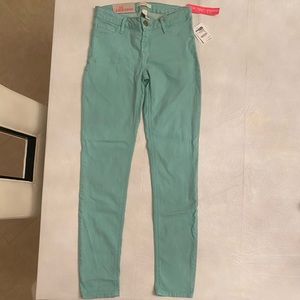 Teal blue skinny jeans / jegging fit